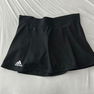 Adidas black skirt w/ built-in shorts. Size S.
